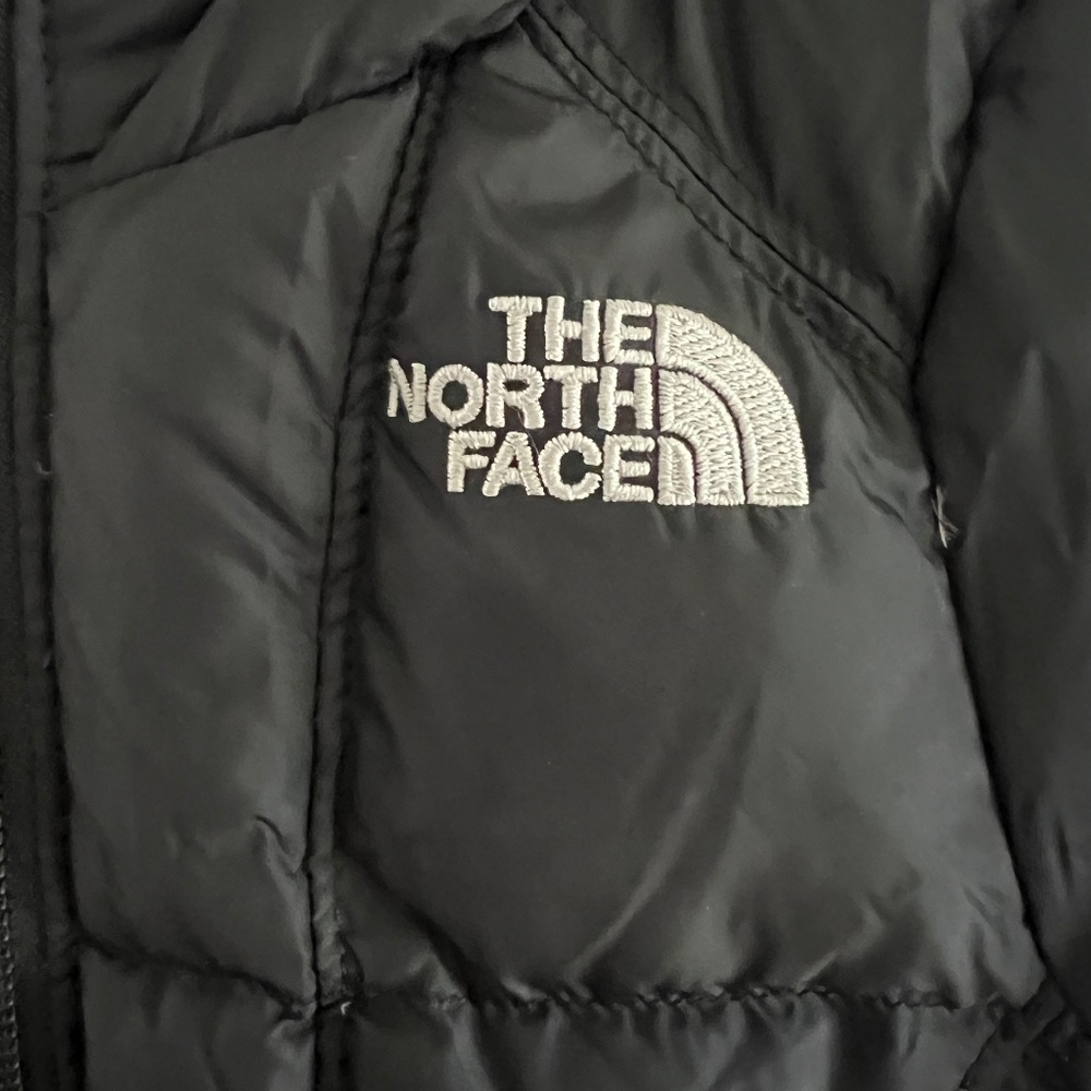 The North Face Black Puffy Jacket with White Logo